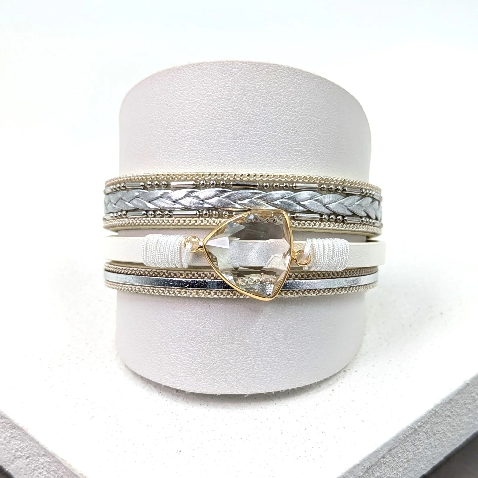 Multi-strand PU magnetic cuff with plaited strand and crystal feature