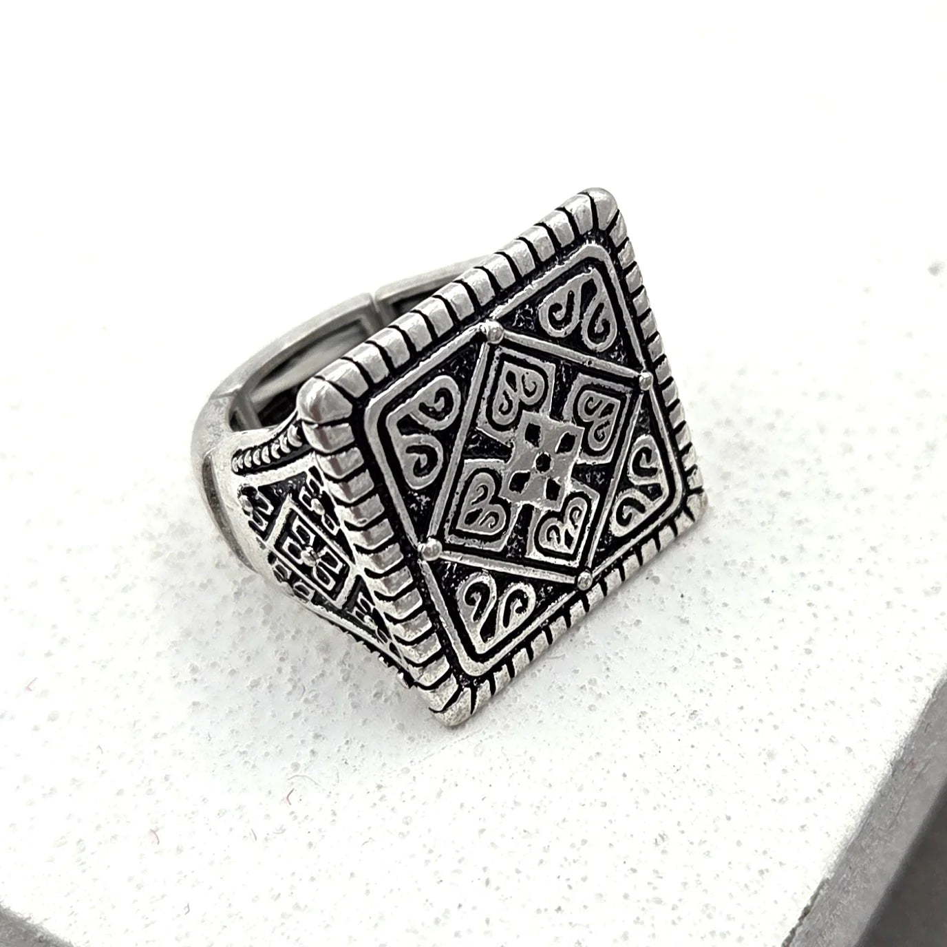 Square tribal pattern on stretchy ring