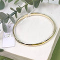 Contemporary simple soft beaten effect bangle