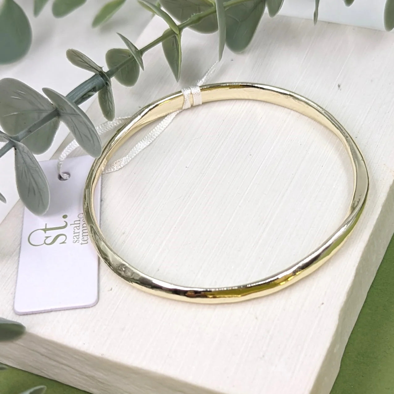 Contemporary simple soft beaten effect bangle