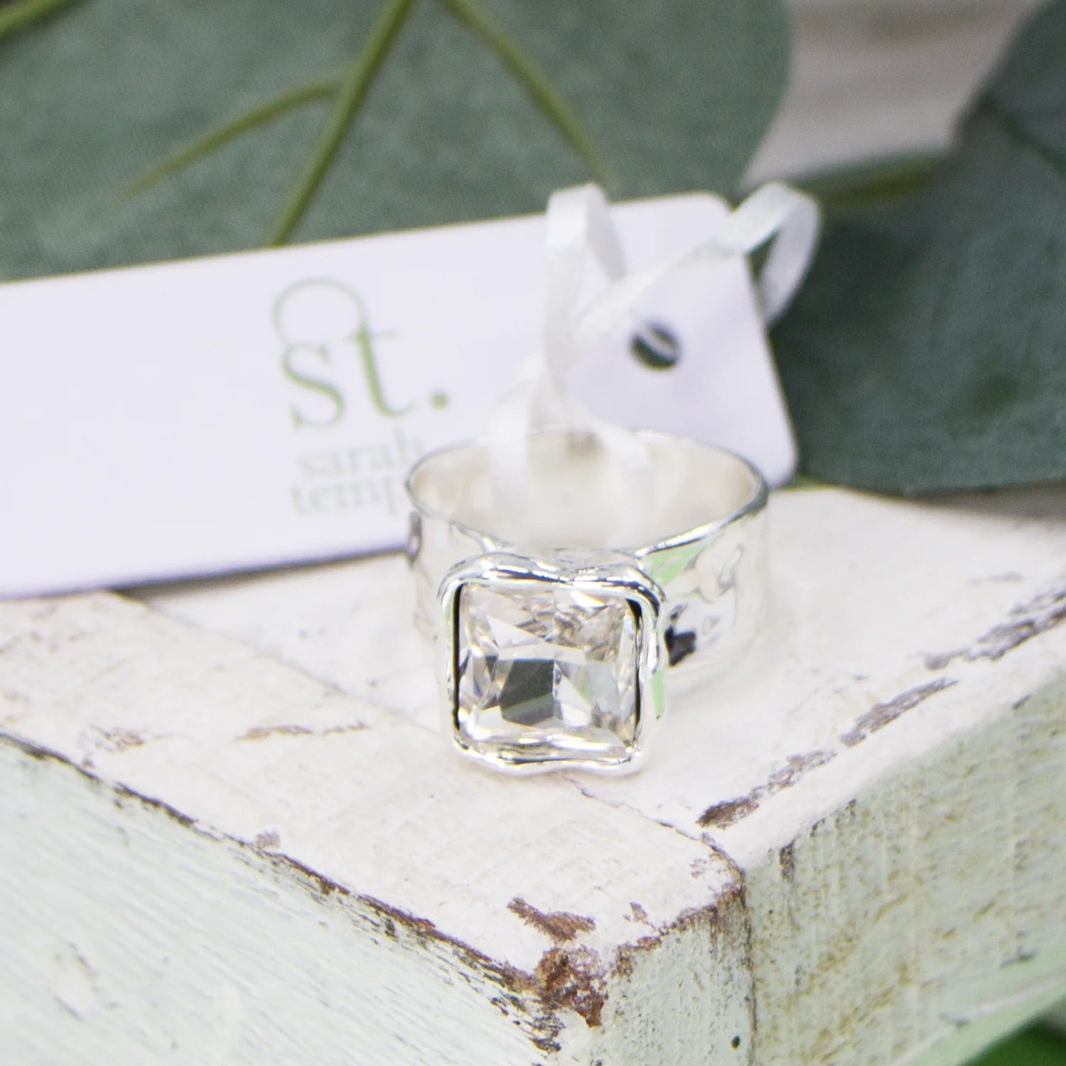 Chic square crystal ring with soft beaten effect setting and band